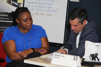A wounded warrior receives feedback on her resume at a Deloitte employment boot camp at Wounded Warrior Project's headquarters in Jacksonville, Florida.