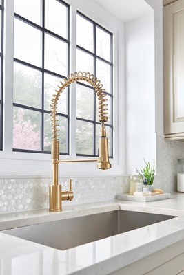 Gerber Parma Pre-Rinse Kitchen Faucet in Brushed Bronze.