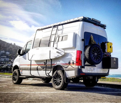 Storyteller Overland Beast MODE concept with surf rack, hinge mounted spare tire carrier, Sherpa Rack and rear locker box.