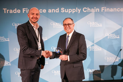Photo shows left to right: Mike Walker, Head of Working Capital Finance, Asia Pacific at Finastra collecting the award from Global Finance Publisher and Editorial Director, Joseph Giarraputo