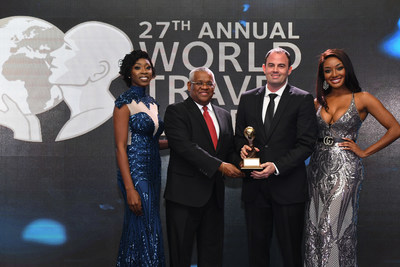 Island Routes is victorious as eight time award winner of the Caribbean's Leading Adventure Tour Operator at the World Travel Awards with David Shields (L), Vice President of Sales; and Ryan Terrier (R), Vice President of Operations.