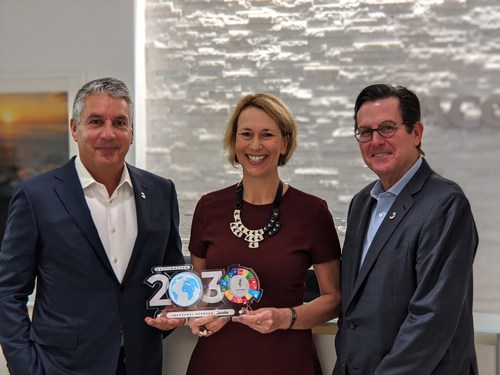 L-R, Jacobs Chair and CEO Steve Demetriou, Water For People CEO Eleanor Allen and Jacobs President and CFO Kevin Berryman commemorate Jacobs’ inaugural sponsor contribution to Water For People’s Destination 2030 initiative.