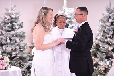 PruittHealth – Augusta Hills administrator, Ashlyn Broderick, marries her husband, Jason, in a ceremony at the facility on Monday, Dec. 23, 2019 in Augusta, Ga. Broderick’s coworker, Della Mervin, performed the ceremony. (Sean Rayford/AP Images for PruittHealth)
