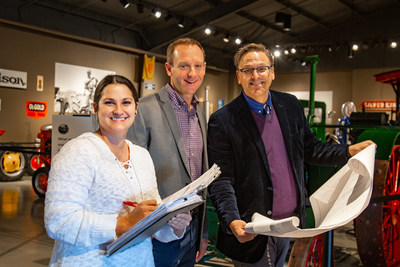 Discovery Park of America Director of Exhibits, Jennifer Wildes (left) and CEO, Scott Williams (right) share agriculture exhibit plans with Nutrien Ag Solutions General Manager of the Tennessee/West Kentucky Division, Todd Theobald.