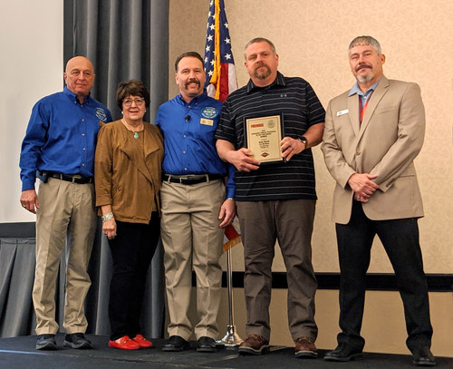Spartan Motors and Firehouse magazine present the EVT of the Year Award at the FDSOA Fire Safety Conference. Left to Right: Rich Marinucci, Executive Director, FDSOA; Janet Wilmoth, Special Projects Director, Firehouse; Eric Valliere, Chairman, FDSOA; Brian Marek, EVT of the Year Award winner; and Jeff Seal, OEM Account Manager, Spartan Motors.