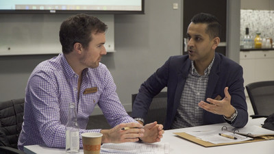 Chipotle executive Haris Khan advising Alexander McCoy, Founder and CEO of American Ostrich Farms, during the 2019 Chipotle Aluminaries bootcamp