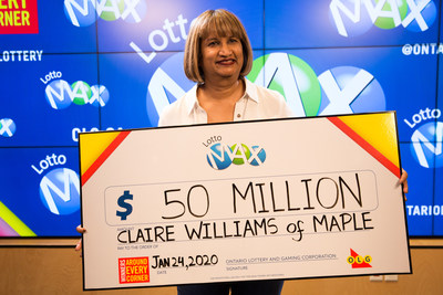 Claire Williams of Maple accepts her $50 million cheque at the OLG Prize Centre in Toronto. Claire won the Friday, January 17, 2020 LOTTO MAX jackpot. (CNW Group/OLG Winners)