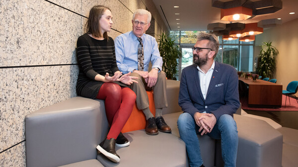 Gladstone Senior Investigator and President Emeritus Bob Mahley (center) will collaborate with the director of the Gladstone Mass Spectrometry Facility, Danielle Swaney (left), and Senior Investigator Nevan Krogan (right) to uncover the mechanisms of apoE4 toxicity in Alzheimer's disease.