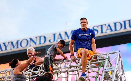 Stadium Blitz Owner and Partner, Rob Gronkowski competes alongside Stadium Blitz participants at an event held earlier this year.
