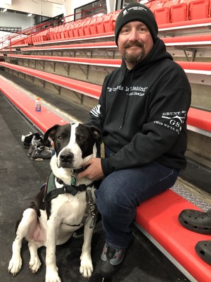 Veteran Michael Pais brought his entire family to the ice rink: wife, daughters, grandson, and Gator the dog. Being able to connect with other families is one of the things that keeps Michael engaged with Wounded Warrior Project® (WWP). This time, his family got to ice skate together and meet other veterans and families. Veteran Michael Pais brought his entire family to the ice rink: wife, daughters, grandson, and Gator the dog. Being able to connect with other families is one of the things that keeps Michael engaged with Wounded Warrior Project® (WWP). This time, his family got to ice skate together and meet other veterans and families.