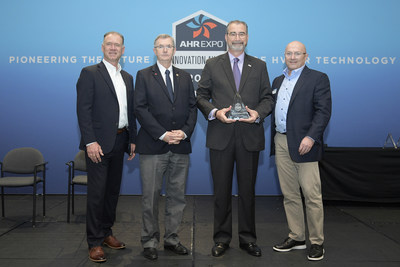 Senior vice president and general manager, Kevin McNamara (center right), accepts the 2020 AHR Innovation Award for the LG Hydro Kit, on behalf of LG Air Conditioning Technologies. The LG Hydro Kit is an indoor heat exchanger for LG Variable Refrigerant Flow (VRF) systems capable of transferring heat or cooling energy expelled from the air conditioning process to water, further capitalizing on the efficiency of LG heat recovery and heat pump systems.