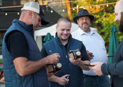 Established in 2010 by two best friends in their hometown of Woodinville, Woodinville Whiskey is celebrating its 10th Anniversary with special celebrations and the release of distillery-only, limited edition whiskeys. Pictured here in 2015, Woodinville co-founders Orlin Sorensen and Brett Carlile introduce their Woodinville® Straight Bourbon Whiskey with mentor and industry icon, the late David Pickerell.