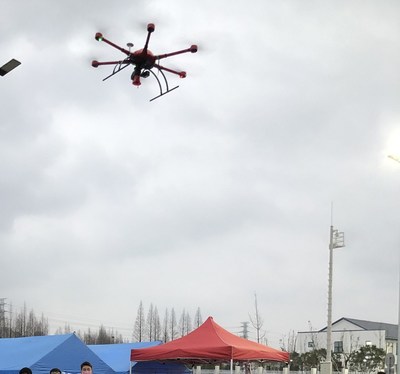 MMC drone with megaphones doing aerial broacasting