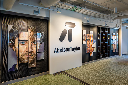 Campaign images and carefully restored historic floor tile greet visitors entering AbelsonTaylor’s new headquarters in Chicago’s Old Post Office.