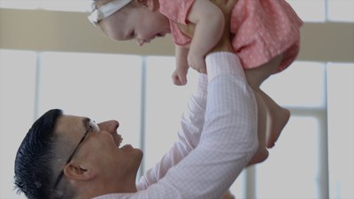 David Foster Foundation Image - Brian holds his daughter Rosie (CNW Group/The David Foster Foundation)