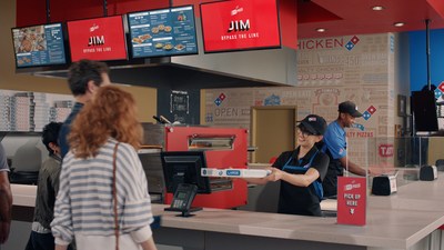 Domino’s new Pie Pass technology allows customers who order and pay online to skip the line and grab their order.