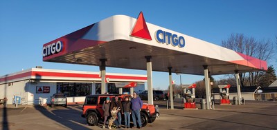 Ultimate Road Trip Sweepstakes grand prize winners, Angela and Scott Braun and their dog, with Northside Plaza CITGO owners Dean and Paula Styczynski at the Northside Plaza CITGO, 285 N Main Street in Clintonville, Wisconsin.