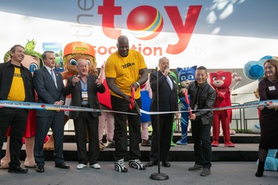 Shaquille O’Neal and toy photographer Mitchel Wu cut the ribbon to open the 117th Toy Fair New York. They were joined on stage by (left-to-right) Basic Fun! CEO Jay Foreman; Skip Kodak, executive vice-president of the Americas at LEGO Systems; Bob Wann, chief playmonster at PlayMonster; and The Toy Association’s president & CEO Steve Pasierb and Marian Bossard, executive vice president of global market events.