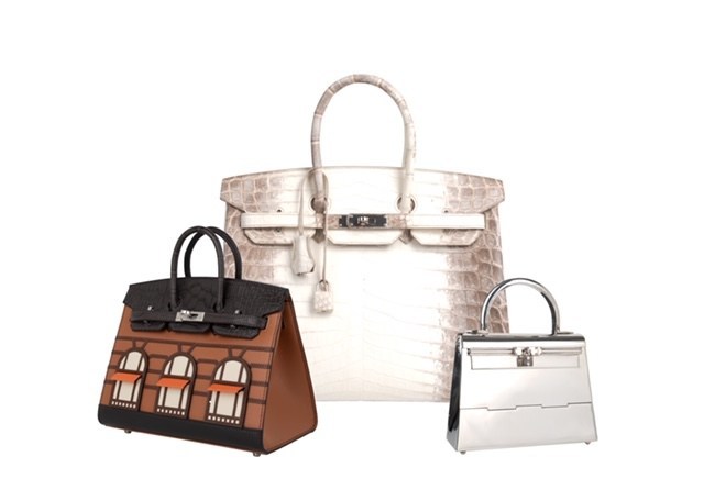 Three of the rarest Hermes handbags ever created, including the Kelly Mini in Sterling Silver, Birkin in Himalayan White Crocodile, and a Birkin bag modeled after Hermes' famous Paris flagship store. To be sold at auction by Greenwich Luxury Auctions, March 5, 2020.