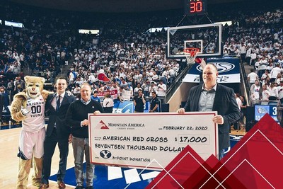 Mountain America presents a $17,000 check to the American Red Cross at the February 22, 2020, BYU basketball game.