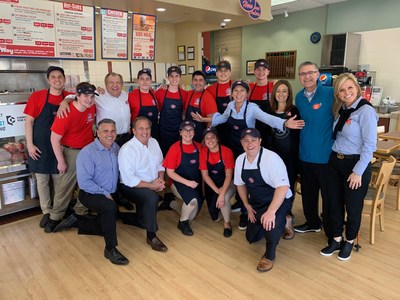 Jersey Mike's Founder & CEO Peter Cancro (kneeling, 2nd from left) celebrated the company's Annual Day of Giving in 2019 at the Northridge, Calif. restaurant.