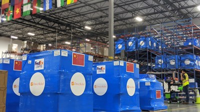 Shipments of protective gear, destined for hospitals in China battling the coronaviru, are prepared for delivery at Direct Relief's warehouse on Feb. 13, 2020. Direct Relief has shipped more than 30,000 pounds of requested items since the start of the outbreak. (Tony Morain/Direct Relief)