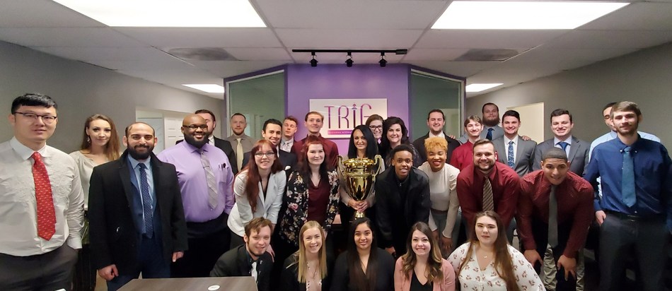 The team at Trig, Inc. celebrates its Campaign Cup win.