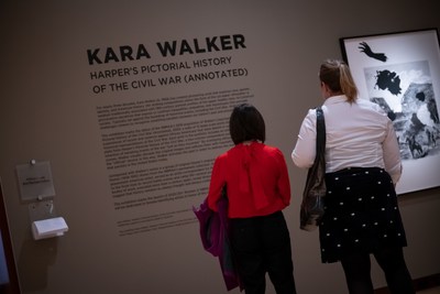 Visitors view artwork by Kara Walker at the New Britain Museum of American Art.