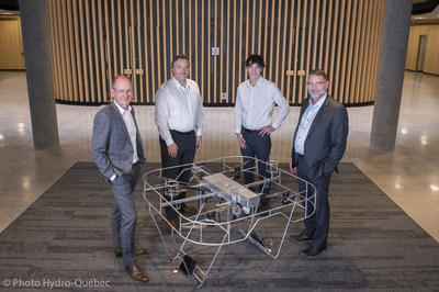 From left to right: Christian Bélanger, Director Strategic and Transversal Projects of Hydro-Québec's Research Institute, Olivier Gualdoni, Executive Chairman & CEO at DRONE VOLT, Martin Laporte, CEO of DRONE VOLT Canada, and Jean Matte, Senior Director of Hydro-Québec's research institute. (CNW Group/Hydro-Québec)