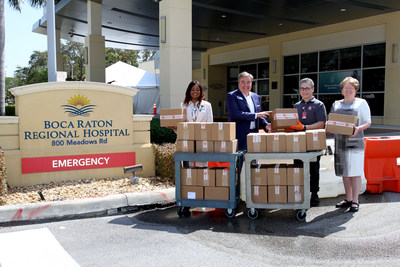Gift of Life Marrow Registry donates 10,000 urgently needed swabs to Boca Raton Regional Hospital to aid in testing patients for COVID-19. L_R: Gwenesia Collins, PharmD, CPh, Assistant Vice President of Clinical Ancillary Services, Boca Raton Regional Hospital, Mark Larkin, President, Boca Raton Regional Hospital Foundation, Jay Feinberg, Gift of Life Marrow Registry Founder and CEO and Nancy Orynich, Director, Laboratory/Pathology, Boca Raton Regional Hospi
