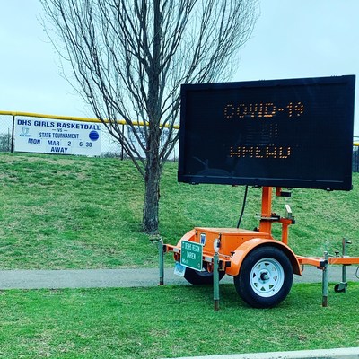 COVID 19 testing sign at local high school.