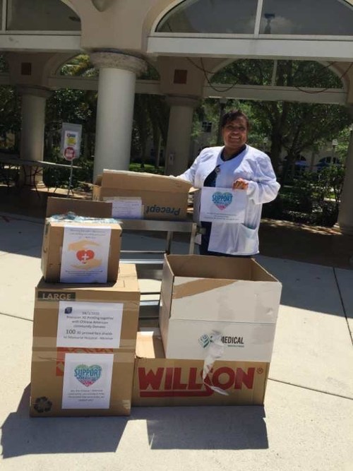 A nurse at one of the Broward hospitals expresses gratitude at the large donation of face masks from American Heritage School.