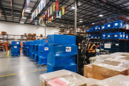Pallets of surgical masks, donated by AstraZeneca, are prepared at Direct Relief's global distribution facility in California for delivery via FedEx to health workers battling Covid-19 across the United States. (Photo: Direct Relief)