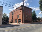 ArachnidWorks Purchases Historic Building on South Carroll Street