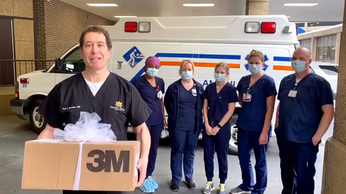 Dr. Rhys Branman donating new PPE to frontline hospital workers in Little Rock, Arkansas