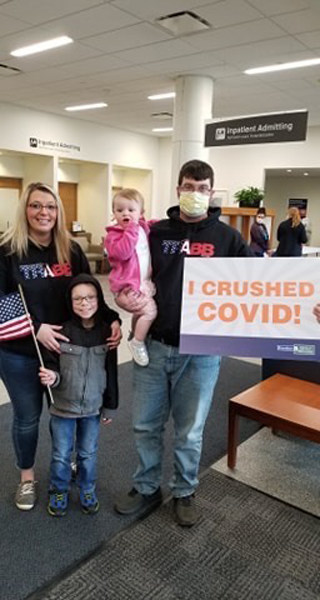 Billy, a 27-year-old from Jackson, Wis., said he was inspired to fight to recover from COVID-19 and motivated by support from his loving family, his trucking community, music, strangers who rallied for him, and the unending care of medical staff at Froedtert Hospital and the Medical College of Wisconsin. Billy is pictured here with his fiance Megan, son Damien and daughter Riley.