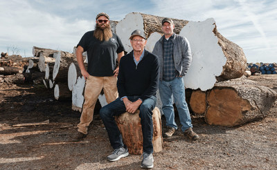 From left to right: John Mahoney of West Coast Arborists (WCA), Bob Taylor and Scott Paul of Taylor Guitars at the WCA lumber yard