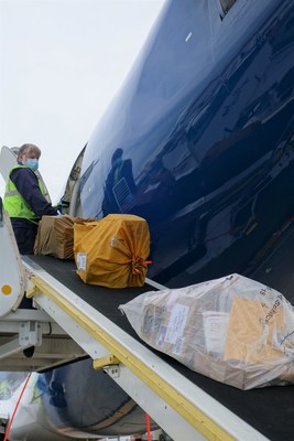 Alaska Air Cargo tests loading freight into the passenger cabin of an Alaska Airlines 737-900 in Seattle. Alaska will be utilizing passenger jets as freighter only aircraft to maximize critical cargo shipments of essential goods.