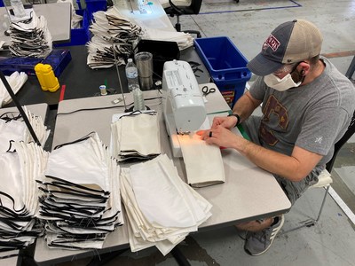 An employee at Tempur Sealy's Medina, Ohio plant sews face masks. TSI plants across the country and around the world are manufacturing products for the COVID-19 relief effort. Many of the face masks are being donated to charity.