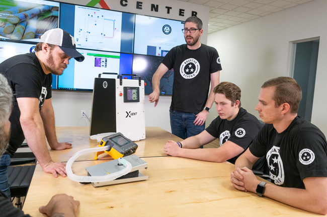 Enexor BioEnergy's, Director of Engineering, Scott Auerbach demonstrating the XVENT's industrial-grade programmable controllers and electronics at work in Enexor's command center.