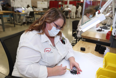 A Honda associate works on assembling a Dynaflo compressor at the Technical Development Center in Marysville, Ohio.