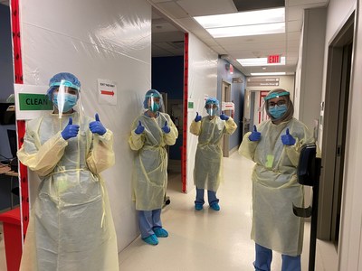 Women’s College Hospital Assessment Centre and Screening staff wearing Spin Master face shields. (CNW Group/Spin Master)