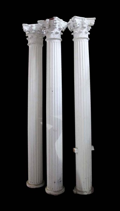 These tall white wooden Corinthian columns would look great anywhere.