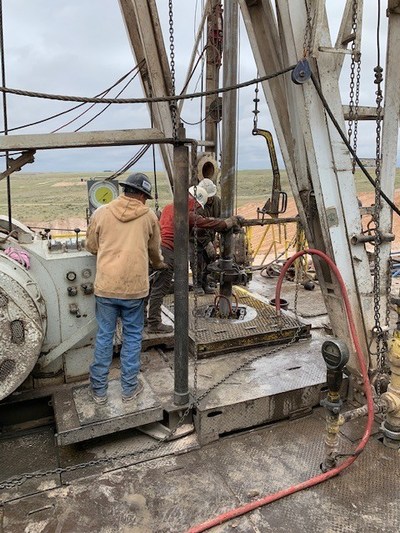 Rig workers on drilling platform in Meade County, Kansas on O'Brien Energy well location