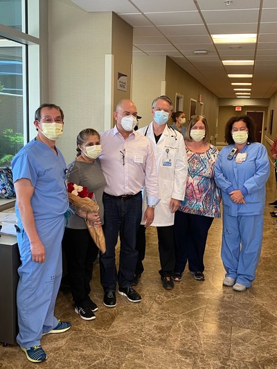Zoila and Diego Laserna stand with members of the team that cared for Zoila for more than seven weeks at Baptist Health Lexington. Team members are left to right: Intensivist Dr. Yuri Villaran; hospital epidemiologist Dr. Mark Dougherty; and nurse leaders Carole Bales, RN, MBA, and Donita Cantrell, RN, MSN.