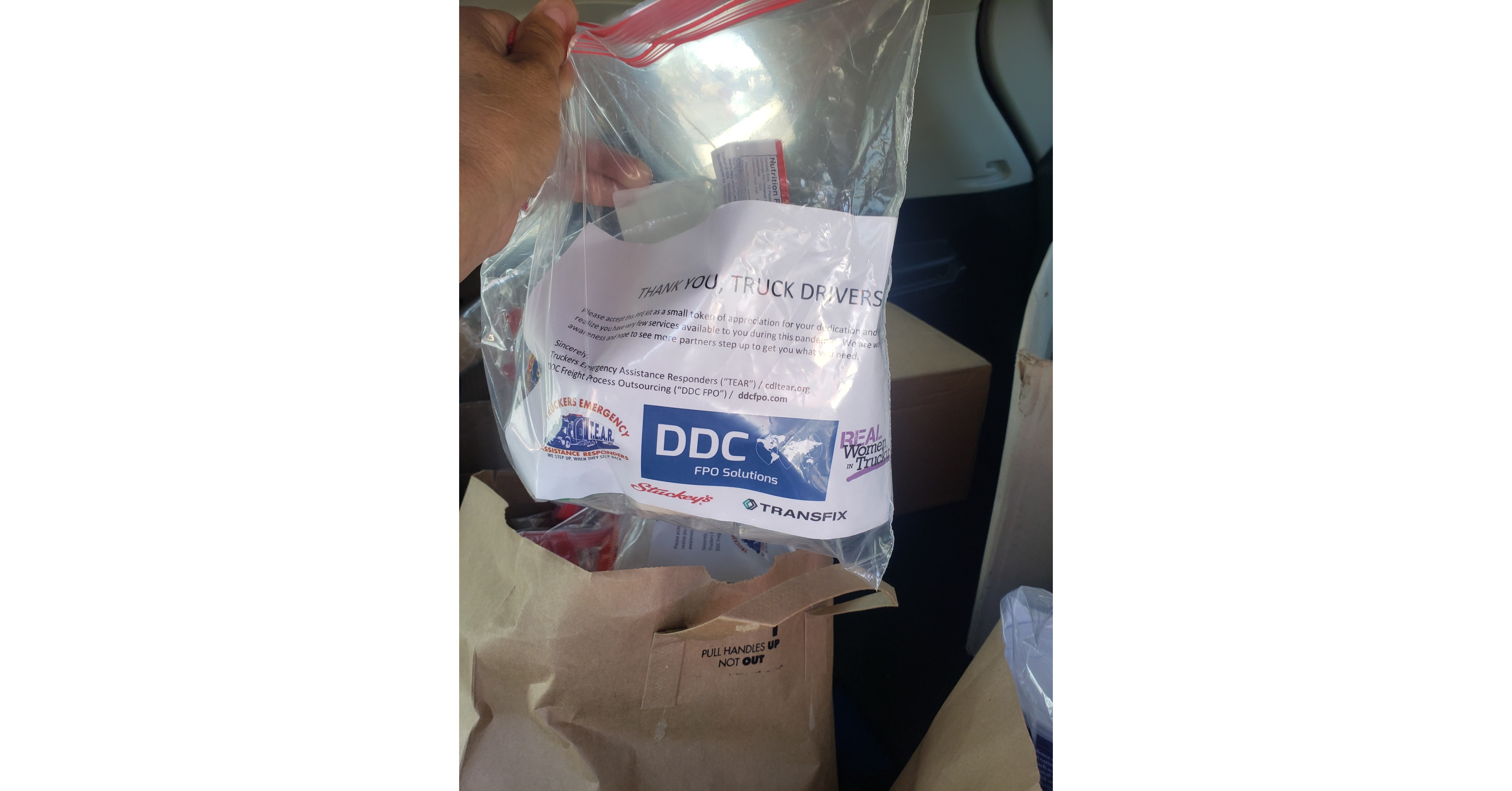 Truck Drivers Receive Personal Protective Equipment (PPE) Kits with the