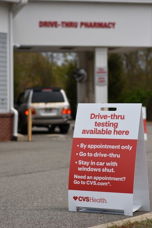 A COVID-19 testing site at a nearby CVS Pharmacy drive-thru, part of the company's plans to operate up to 1,000 test sites around the country by the end of May.