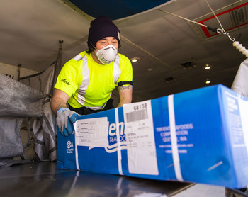 Alaska Air Cargo employees unload the season’s first Copper River salmon from Cordova, Alaska.