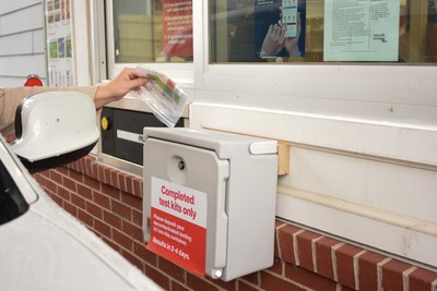 A patient completes a self-swab COVID-19 test at a CVS Pharmacy drive-thru testing site, one of a thousand locations the company plans to operate around the country by the end of May.<br />
Photo Courtesy CVS Health
