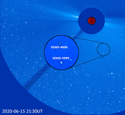 The 4,000th comet discovered by ESA (European Space Agency) and NASA’s SOHO observatory is seen here in an image from the spacecraft alongside SOHO’s 3,999th comet discovery. The two comets are relatively close at approximately 1 million miles apart, suggesting that they could have been connected together as recently as a few years ago. Credit ESA/NASA/SOHO/Karl Battams